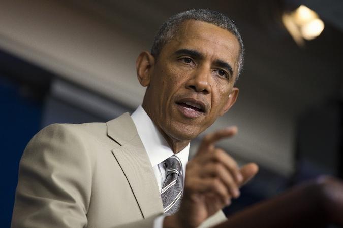 Спорный образ Барака Обамы в бежевом костюме